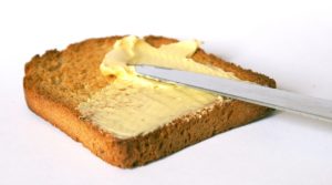 butter , gute butter , fett , ernährung , lebensmittel , essen , stück butter , verpackung , nahrung , ernähren , nährstoffe , nahrungsmittel frühstück butterbrot 